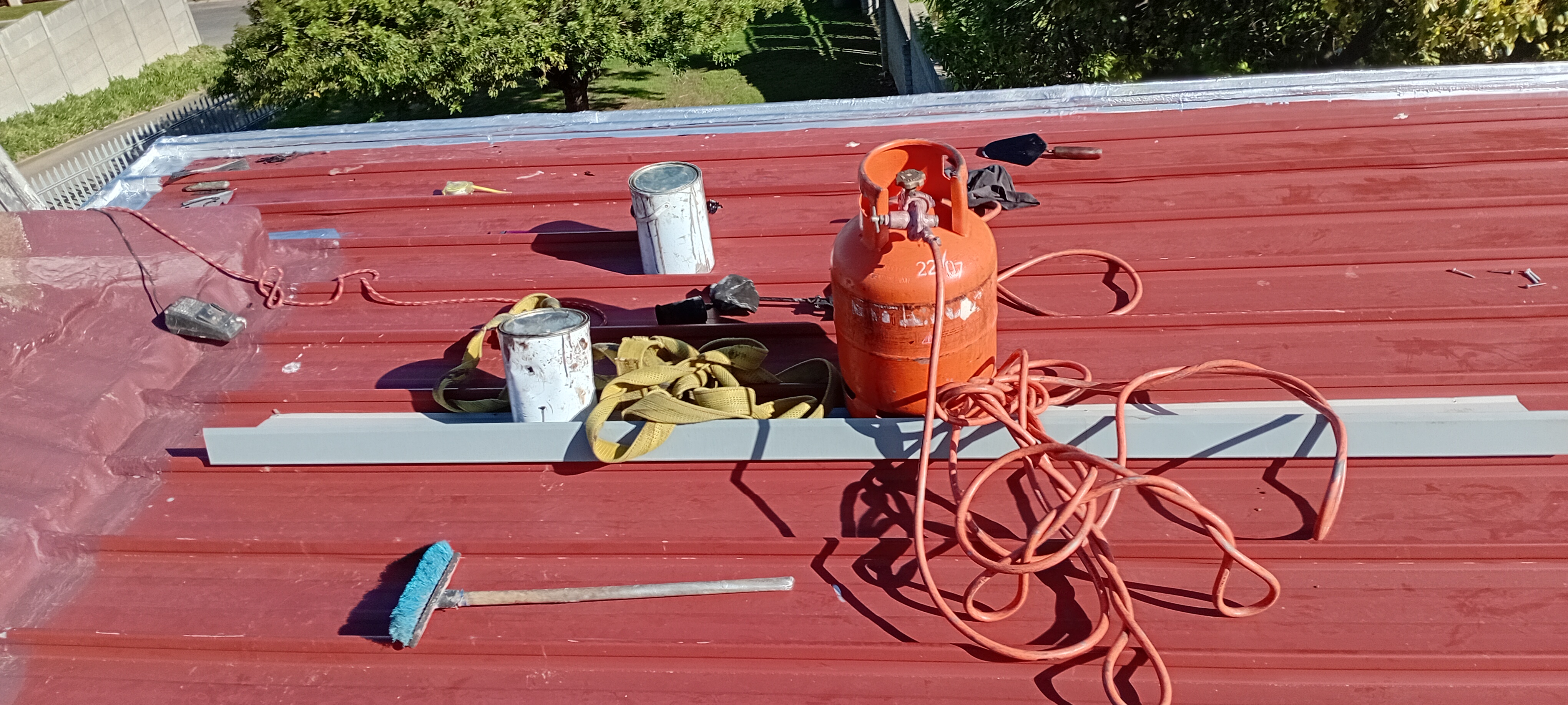 Finished red roof coating and waterproofing detail