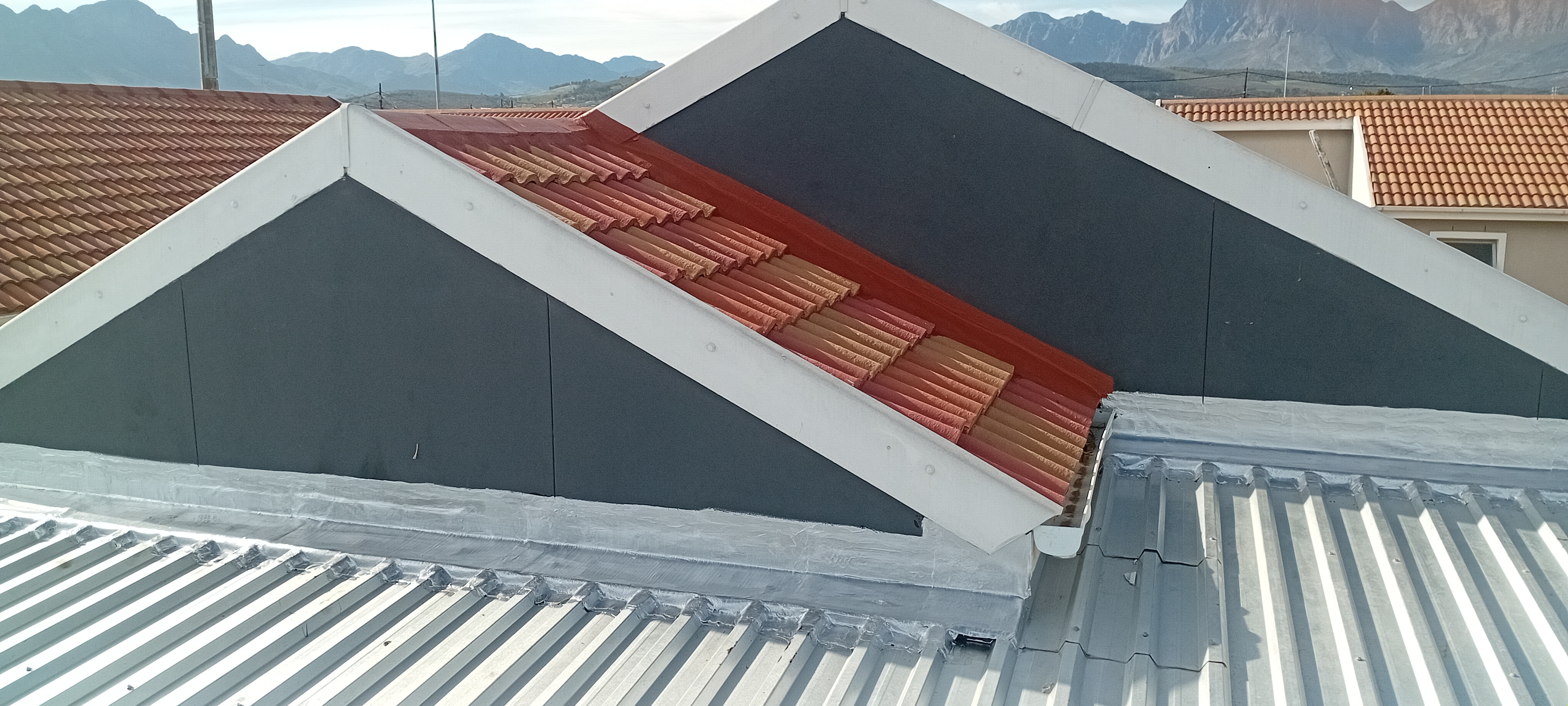 Finished ridge and side flashing waterproofing work